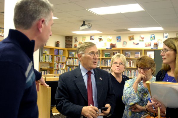 Tuckahoe Superintendent Chris Dyer gives the results from Tuesday night's merger vote at Tuckahoe School.  DANA SHAW