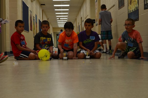 Students raced their individually made cars at Camp Invention last week. Alexa Gorman