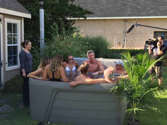 BRAVO TV’s Ryan Serhant on the set of the latest episode of the new series “Sell It Like Serhan" at Ocean Spray Hot Tubs & Saunas in Westhampton Beach. COURTESY OCEAN SPRAY HOT TUBS & SUANAS