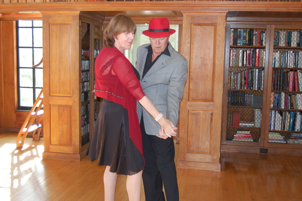 Alfonso Triggiani and Agnes Bristel demonstrate the Argentine tango at a broker's open house, hosted by the Enzo Morabito team in Westhampton Beach.   DAWN WATSON