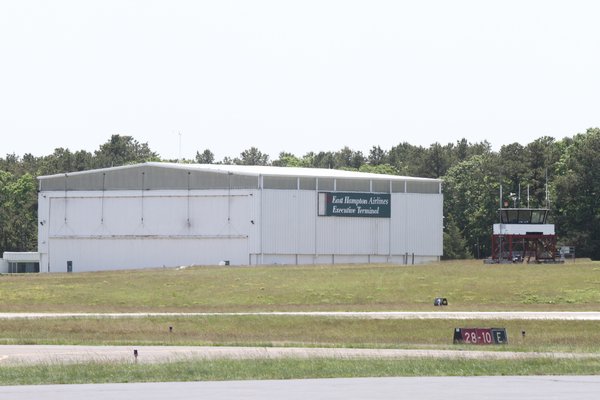 East Hampton Town is in talks with the estate of the late Ben Krupinski to buy out the lease on the East Hampton Executive Terminal hangar at East Hampton Airport.