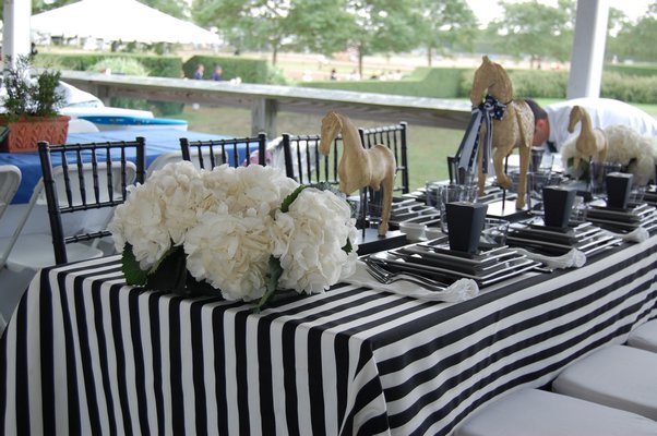 One of the many beautifully decorated tables in the VIP tents at Grand Prix day at this year's Hampton Classic. DAWN WATSON