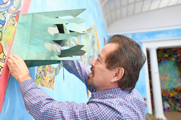 Artist Francisco Alvarado-Juárez at work at the Southampton Arts Center.      DANA SHAW