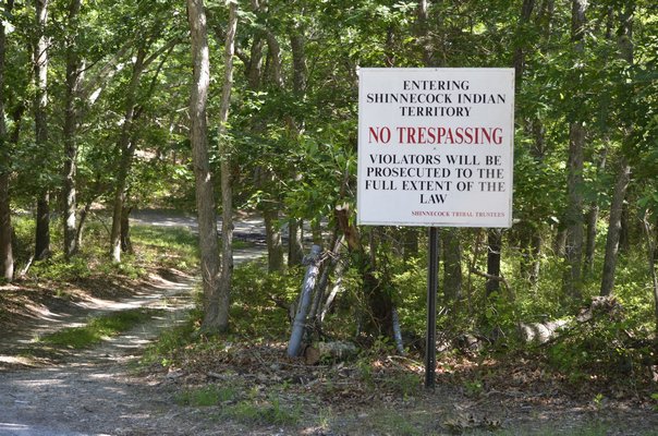 A Shinnecock Indian Nation "No Trespassing" sign at the Westwoods property in Hampton Bays. ANISAH ABDULLAH