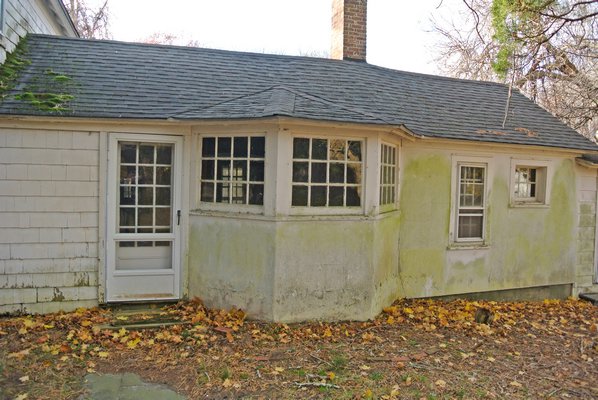 The Ellis Squires House was built in 1785 and still stands off Newtown Road, though vacant and visibly aged.     DANA SHAW