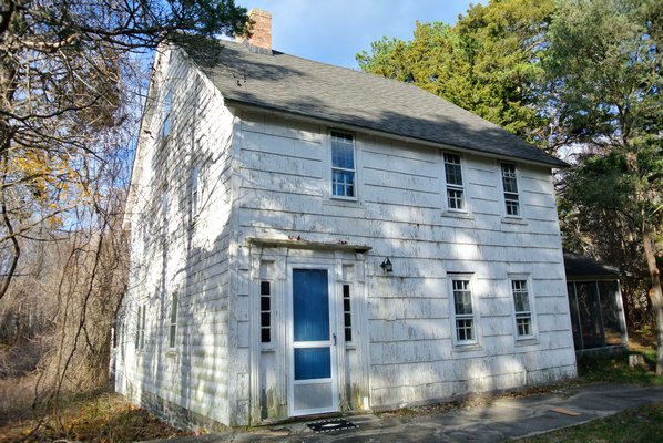 The Ellis Squires House was built in 1785 and still stands off Newtown Road, though vacant and visibly aged.     DANA SHAW