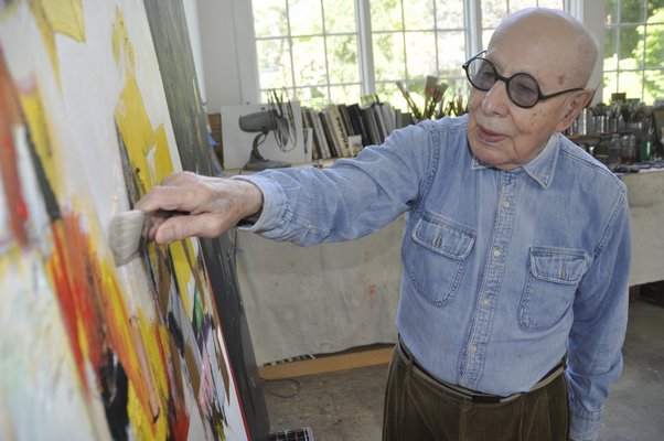 Modernist painter Gerson Leiber at work in his Springs studio. MICHELLE TRAURING