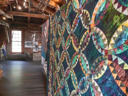 Priced at $2,000, this is the most expensive quilt in the Water Mill Museum's 29th Annual Quilt Show and Sale. It's called "Pickle Dish Wedding Ring." CAREY LONDON