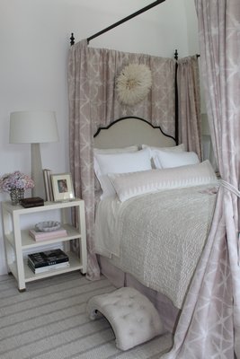 The bed inside the bedroom curated by Kate Singer Home.  JULIA HALSEY
