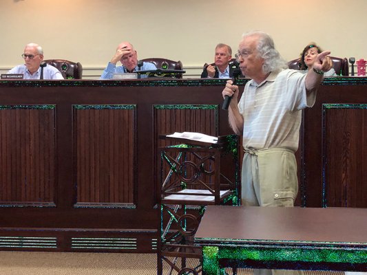 Members of the Quogue community came to the Village's final public hearing on Saturday to discuss the proposal to establish an erosion control taxing district to restore the eastern portion of the village's beach. VALERIE GORDON