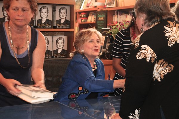 Hillary Rodham Clinton signs copies of her book at BookHampton in East Hamtpn last year.  PRESS FILE