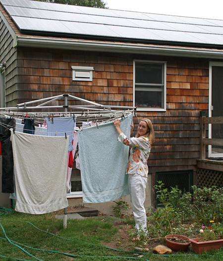 Tina Guglielmo's East Hampton home has a 10 kilowatt photovoltaic system intalled on their roof. Her family also tries to keep energy costs low by hanging their laundry to dry.