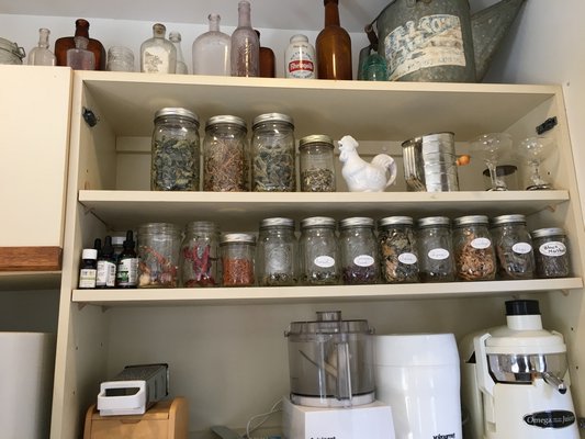 Jars of dried herbs from the Stephenses' garden. LISA DAFFY