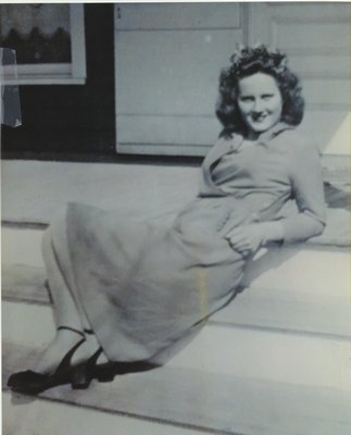 Mary Parker sitting on the front porch of the Pelletreau house in Southampton. COURTESY JUDY PARKER MUSNICKI