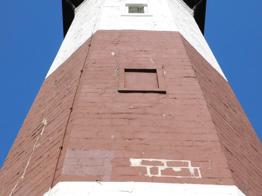 Nick Racanelli, a member of the Montauk Lighthouse Committee, is spearheading fundraising efforts to raise $1.1 million to restore cracks, metalwork, glass and paint on the lighthouse. ELIZABETH VESPE