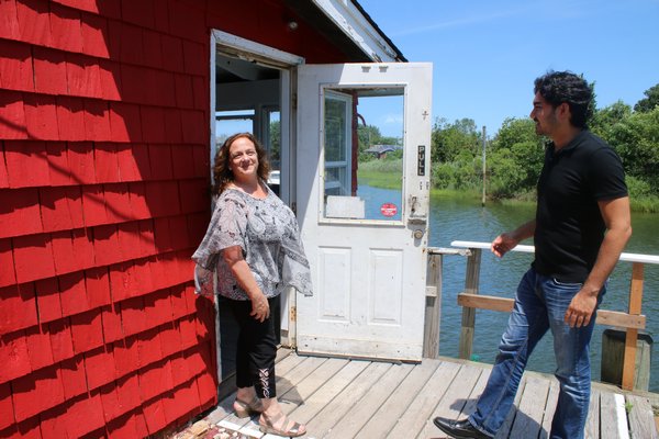 Donna Lanzetta and Ryunoske Jesse Matsuoka on the deck outside their new restaurant Manna. PEGGY SPELLMAN HOEY