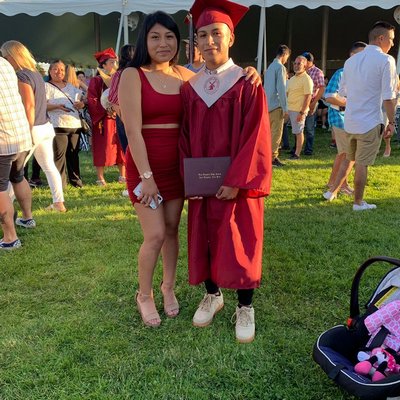 A photo of Erika Bueno and her brother, Paul Bueno, at East Hampton High School graduation on June 29.  FACEBOOK