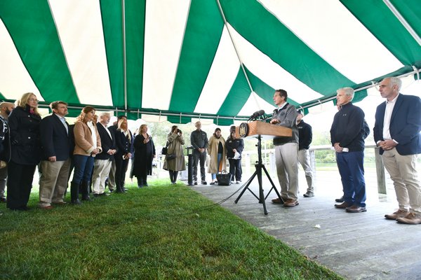 Governor Andrew Cuomo speaks at press conference in Agawam Park on Thursday.  DANA SHAW