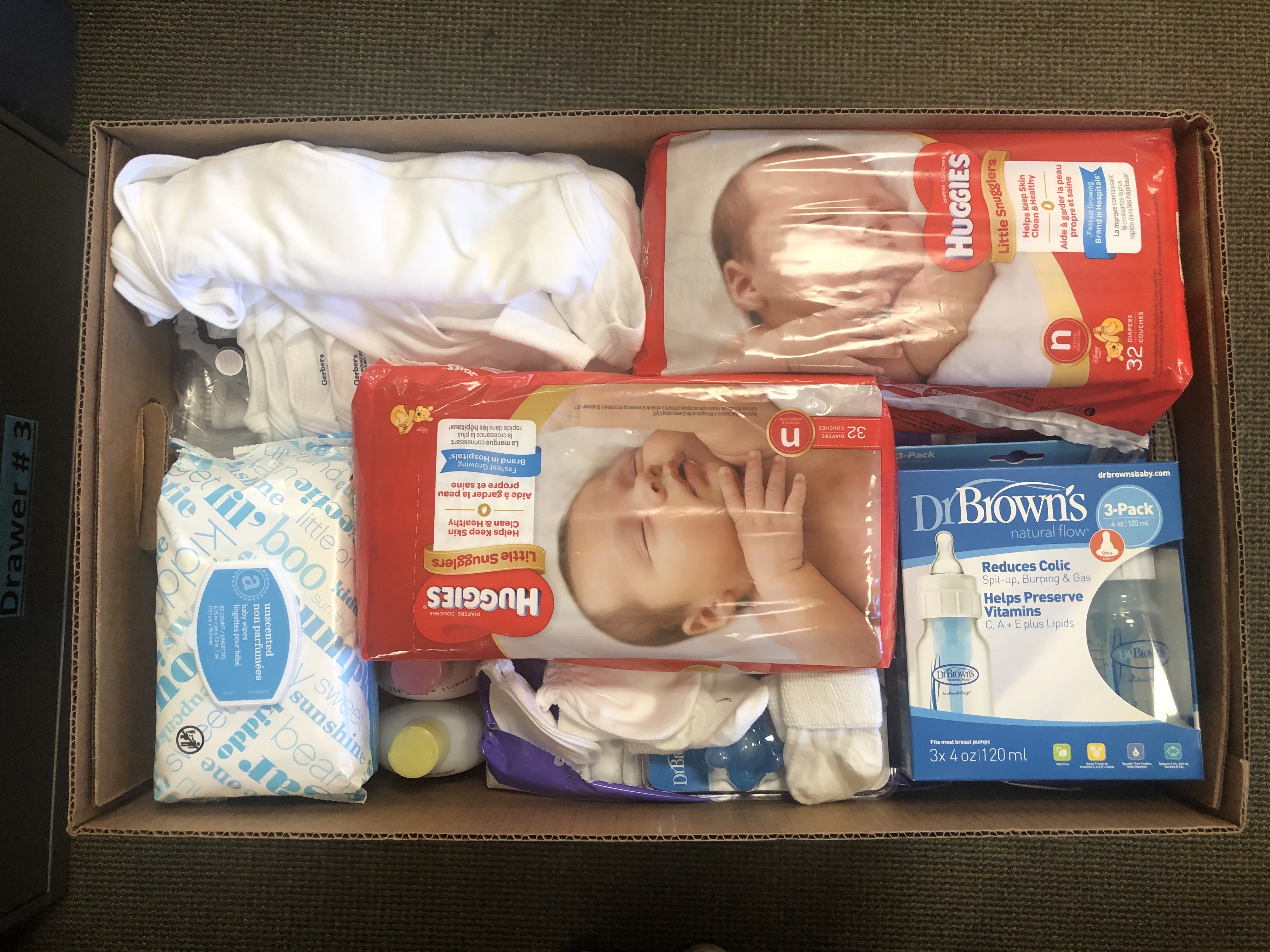 The Welcome Baby care package includes diapers, wipes, bottles, and other things newborn's need for the first four weeks of life.   COURTESY CMEE