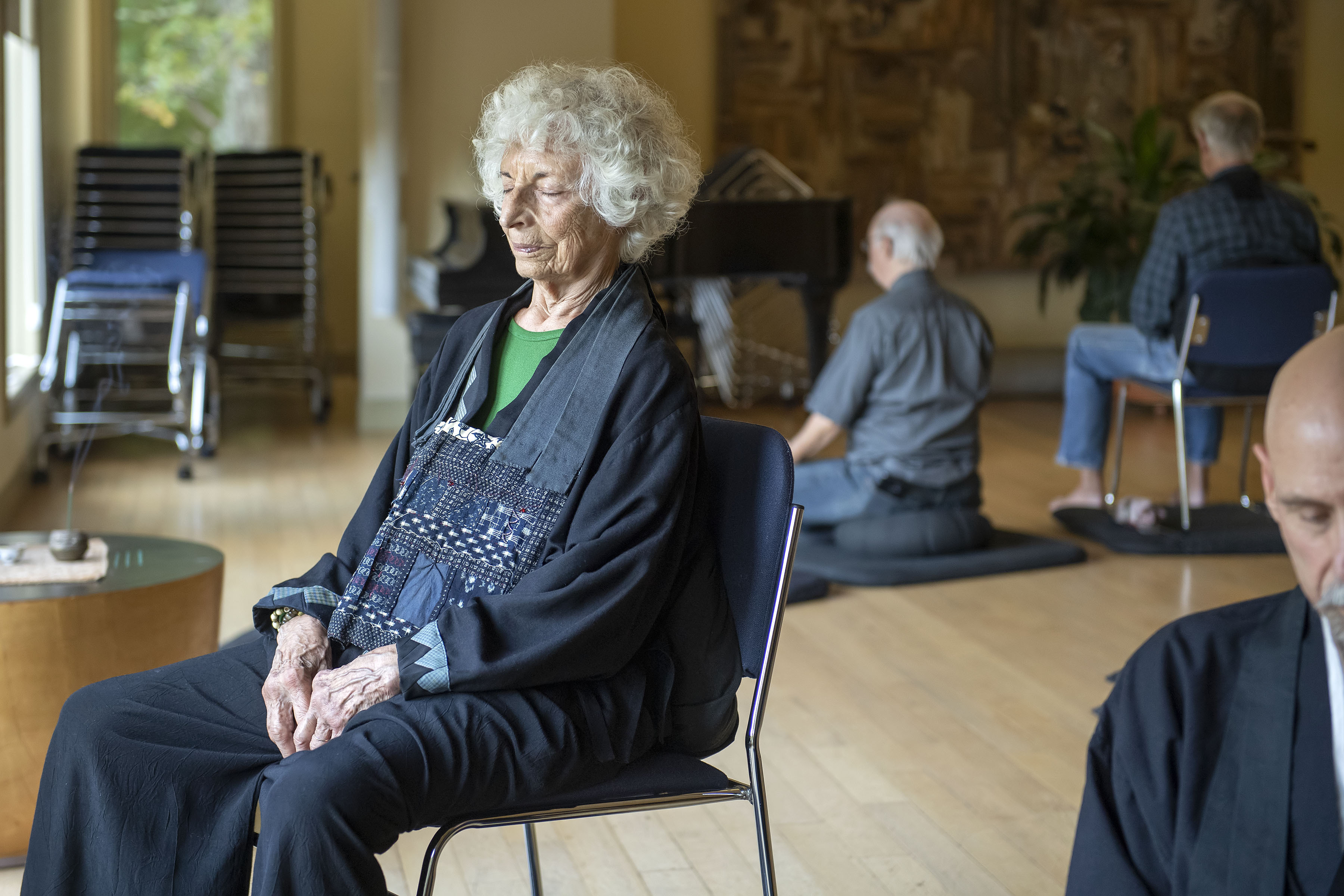 Ninety-year-old Dorothy Friedman meditates during an Ocean Zendo Meditation at the Unitarian Universalist Meeting House in Bridgehampton on Monday, October 14.  MICHAEL HELLER
