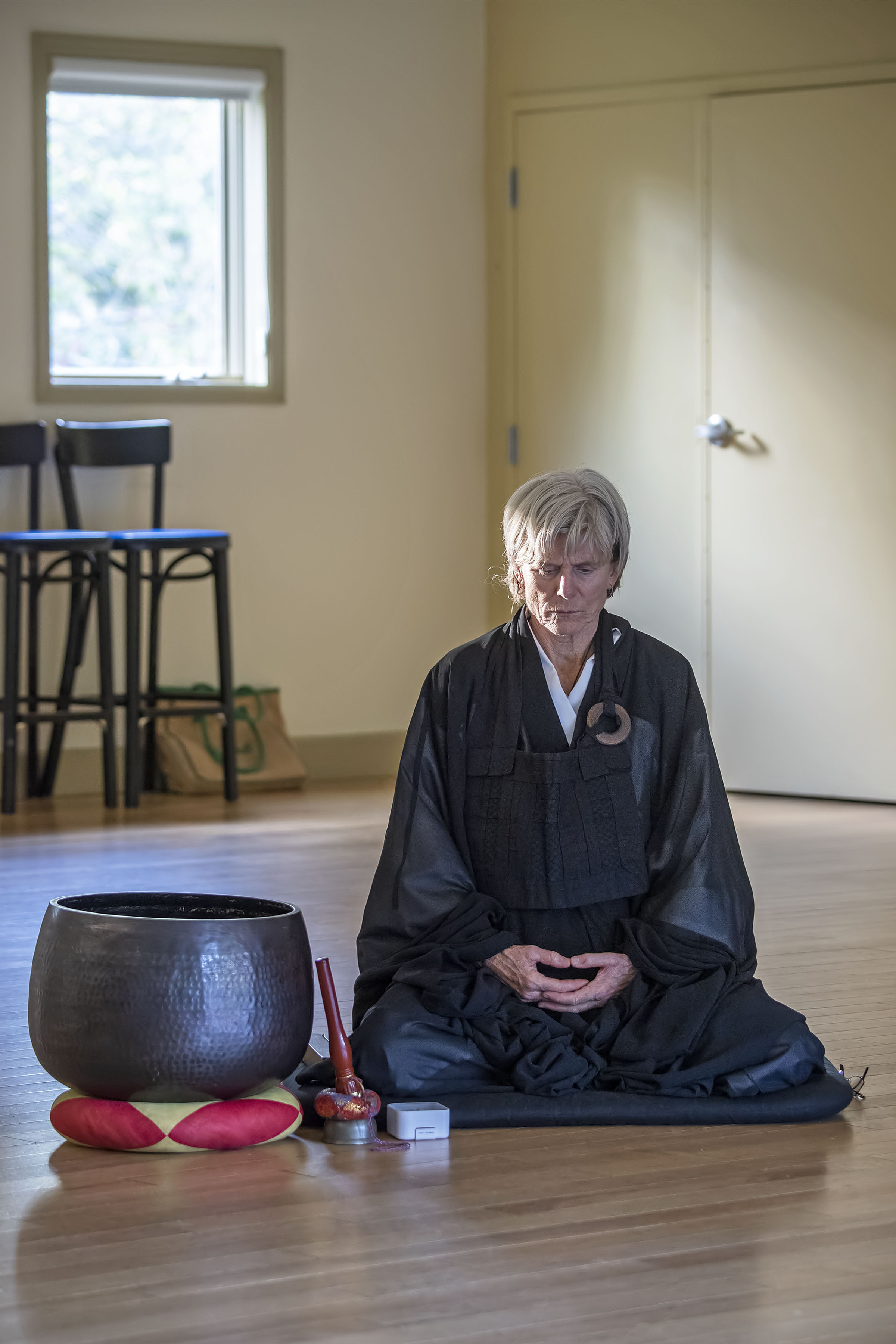 Linda Coleman meditates during an Ocean Zendo Meditation at the Unitarian Universalist Meeting House in Bridgehampton.   MICHAEL HELLER