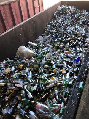 Glass is almost never recycled. Rather