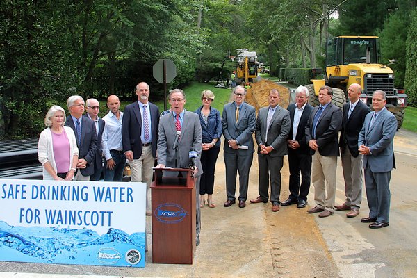 The Suffolk County Water Authority began installing new water supply mains to homes in southern Wainscott as part of an effort funded by East Hampton Town to alleviate concerns about chemically tainted groundwater supplies in the area. Kyril Bromley
