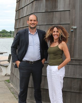 Andrew Strong with OLA of Eastern Long Island's Executive Director Minerva Perez. KYRIL BROMLEY