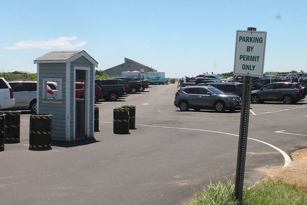 A new kiosk in the western Ditch Plains parking lot warns that parking is for residents only.      KYRIL BROMLEY
