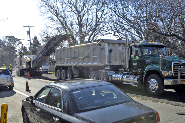 Demolition of the buildings on Ferry Road in Sag Harbor began on Monday morning.    DANA SHAW