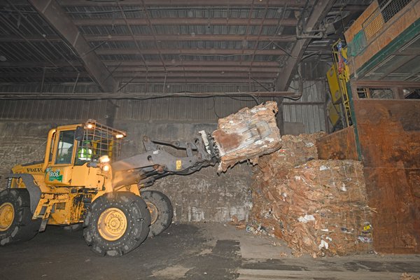 Baled solid waste at the Winters Brothers transfer station in Holtsville. Efforts to reduce waste need to accompany better recycling practices to help solve the problems the industry is currently facing. DANA SHAW