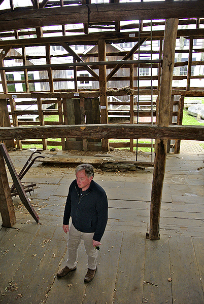 The Sayre Barn has been stripped down to the timbers to be restored.  DANA SHAW