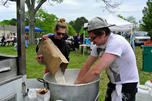 Stefanie Bohlet and Joey Lampiase make the dough for zeppole at Coney Island Joe's.