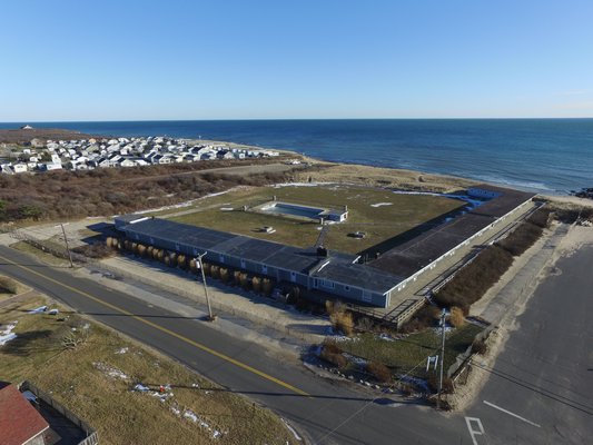 The East Deck Motel property in the Ditch Plains neighborhood of Montauk is the subject of a zone change request to allow the hotel to be torn down and replaced with four residential housing lots.  JPL