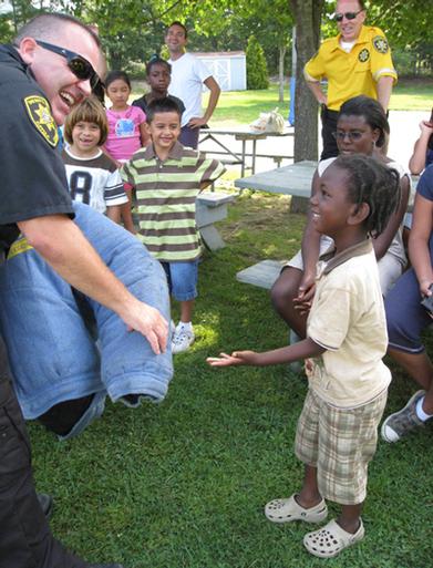 A summer camp with police officers for counselors - 27 East