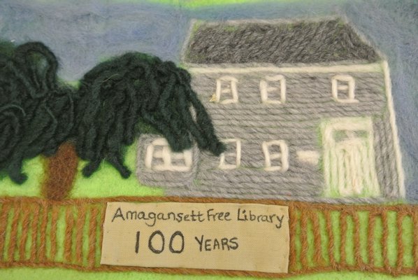 Four quilt pieces created and designed by various members of the Amagansett community for the library's centenial. JAIME ZAHL