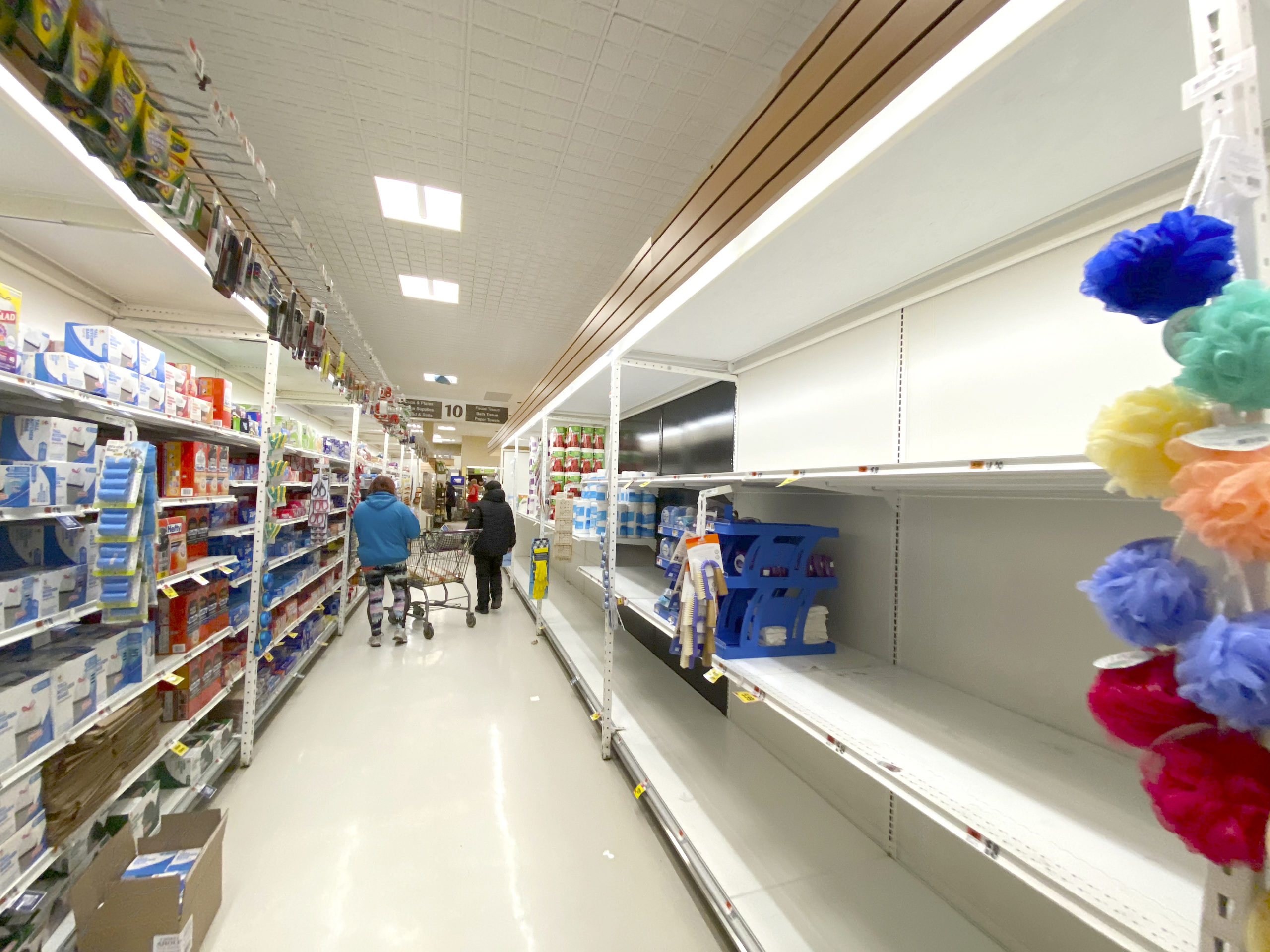 The shelves that were once stuffed with toilet paper were bare at the Stop and Shop in Southampton on Thursday.  DANA SHAW