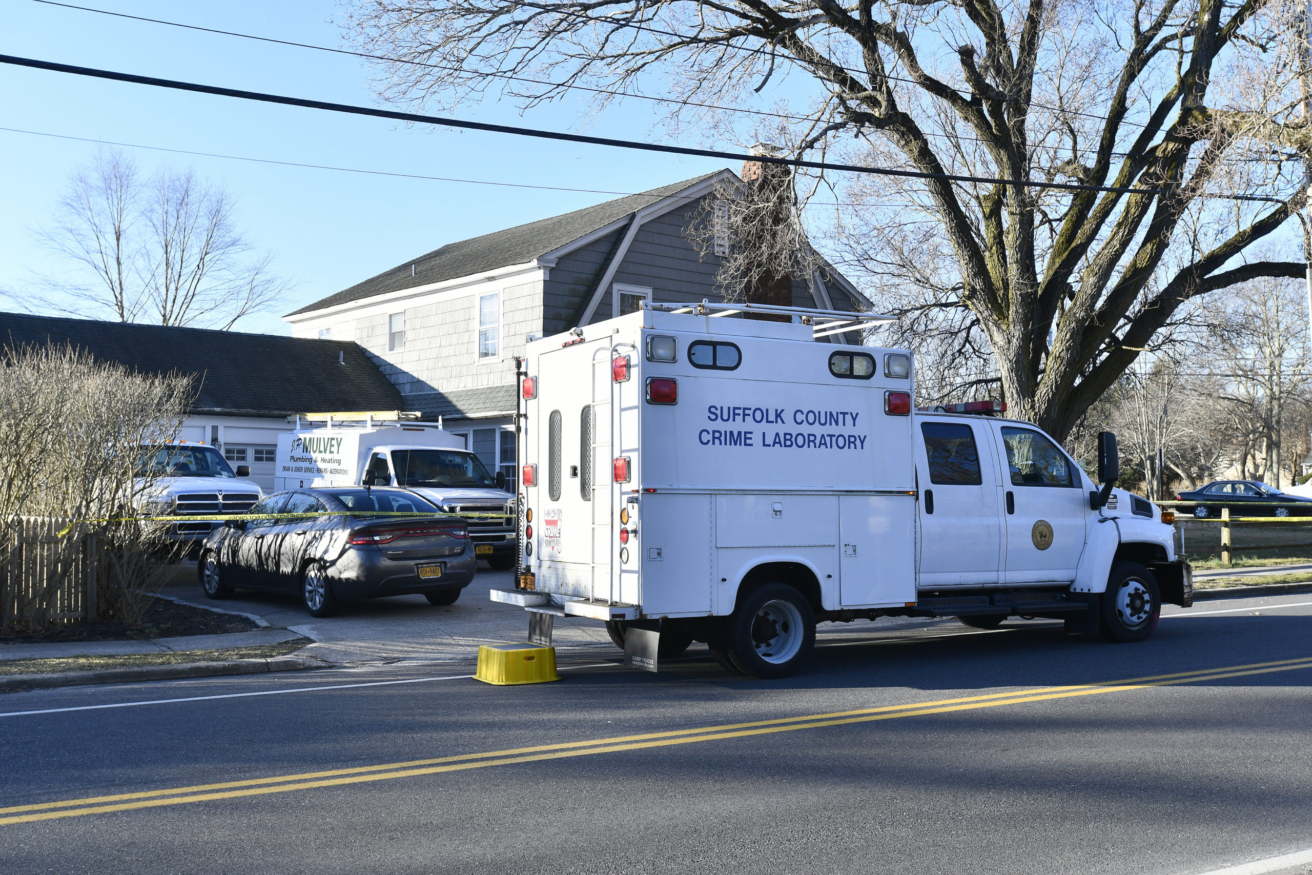Suffolk County crime scene investigators at the Fava-Bray home on March 5. PRESS FILE