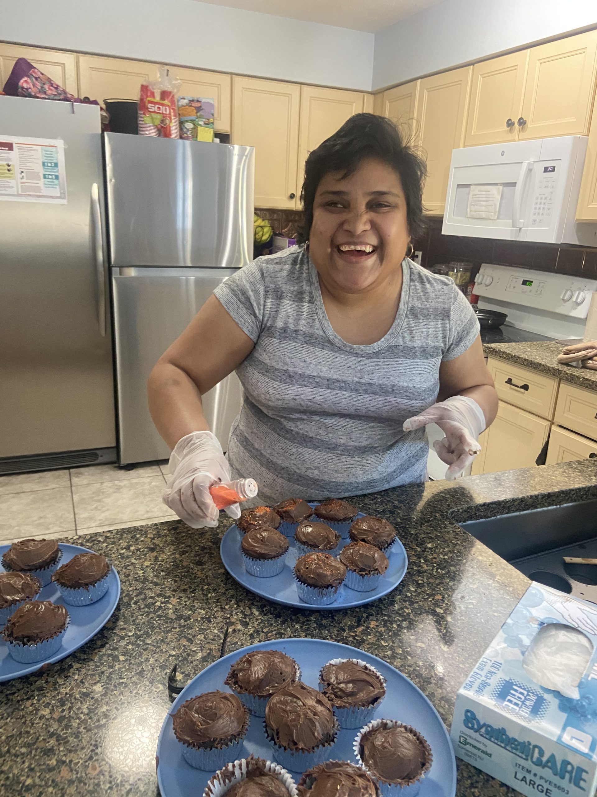 Residents of an East End Disabilities Associates group home made the best of their confinement recently by making cupcakes. 