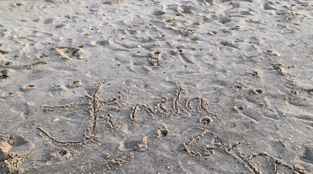 On Easter Sunday, with churches closed, the family quarantined and nowhere to grieve, the Edmonds family went to the beach at sunrise and drew Linda's name in the sand.