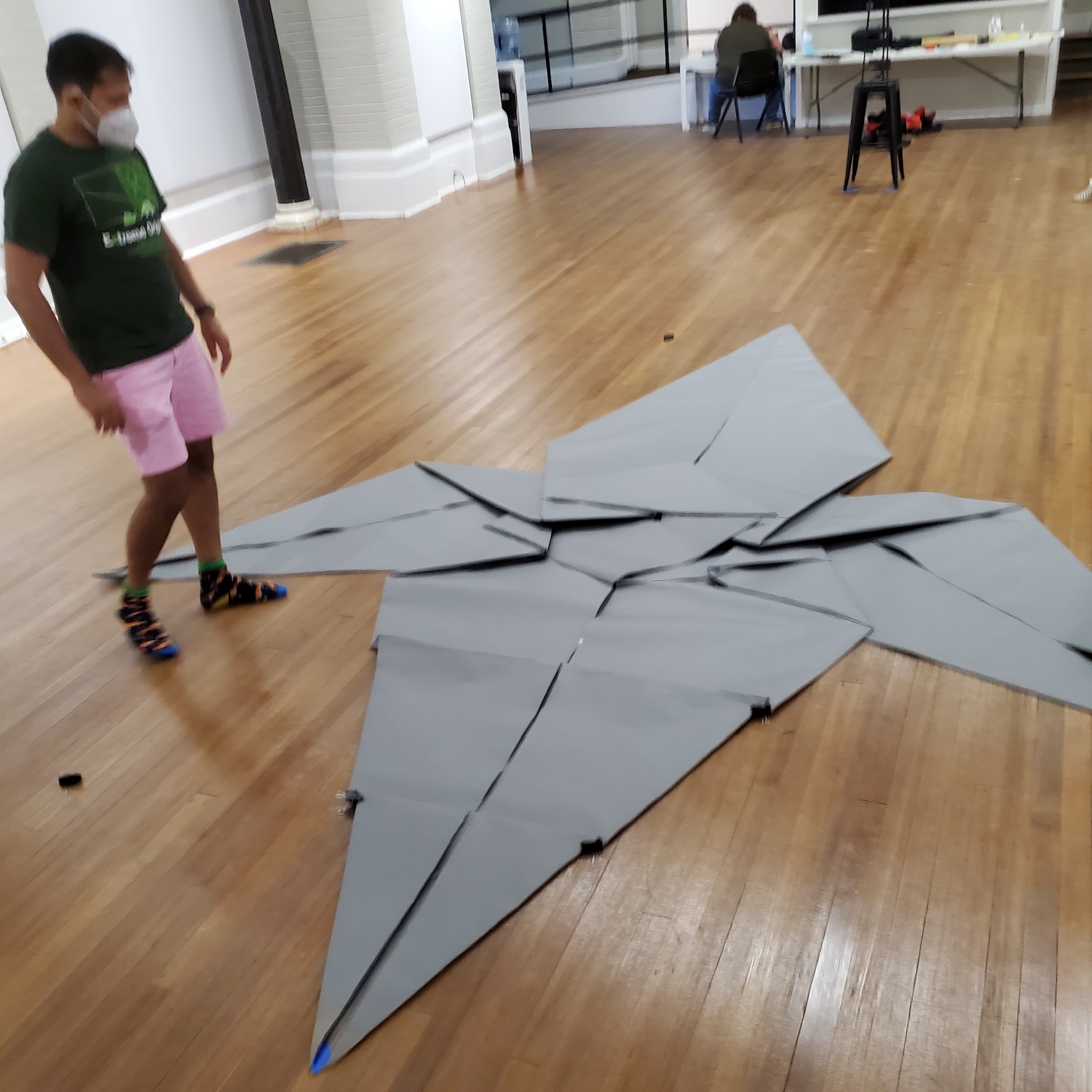 Shrikant Iyer and Paul Frasco recently built the world's largest origami dragon at the Southampton Arts Center.