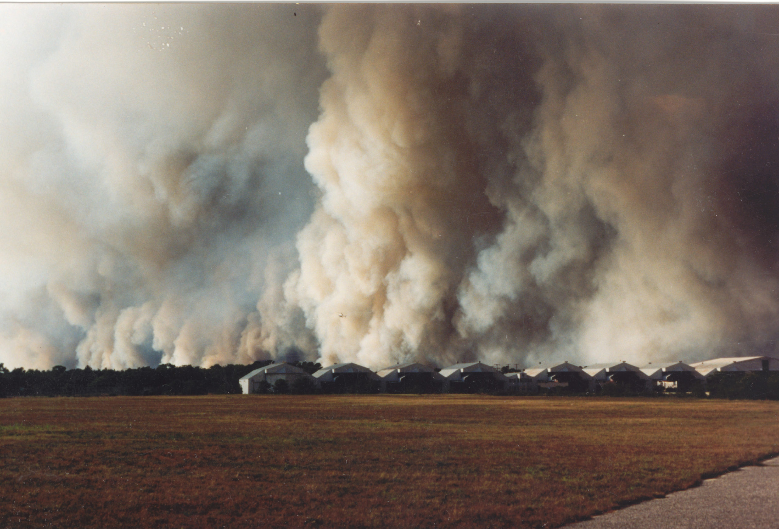 Fire companies from all over Long Island came to fight the wildfires in Westhampton in August of 1995.  COURTESY JIM BAKER.
