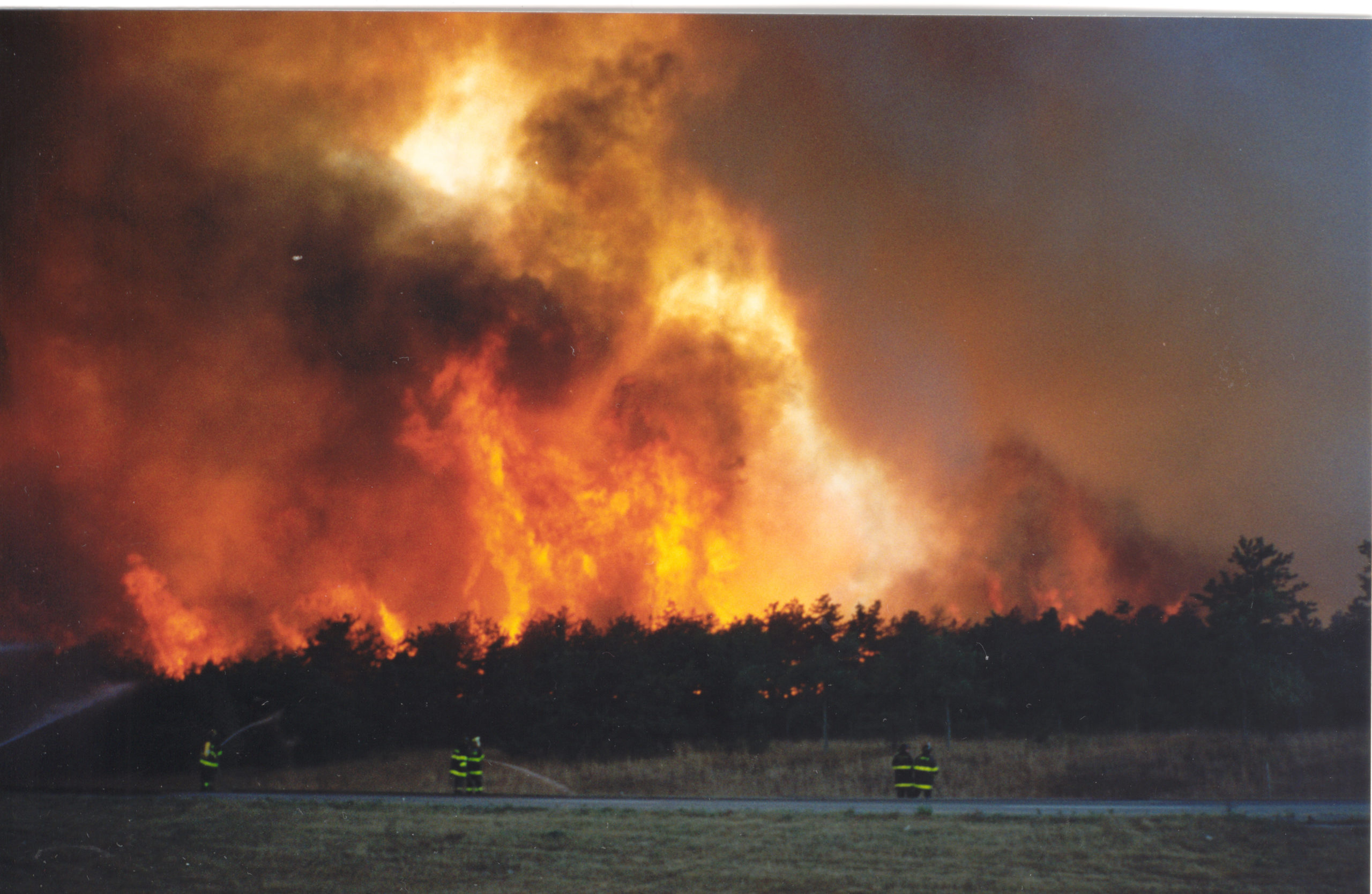 Fire companies from all over Long Island came to fight the wildfires in Westhampton in August of 1995.  COURTESY JIM BAKER.