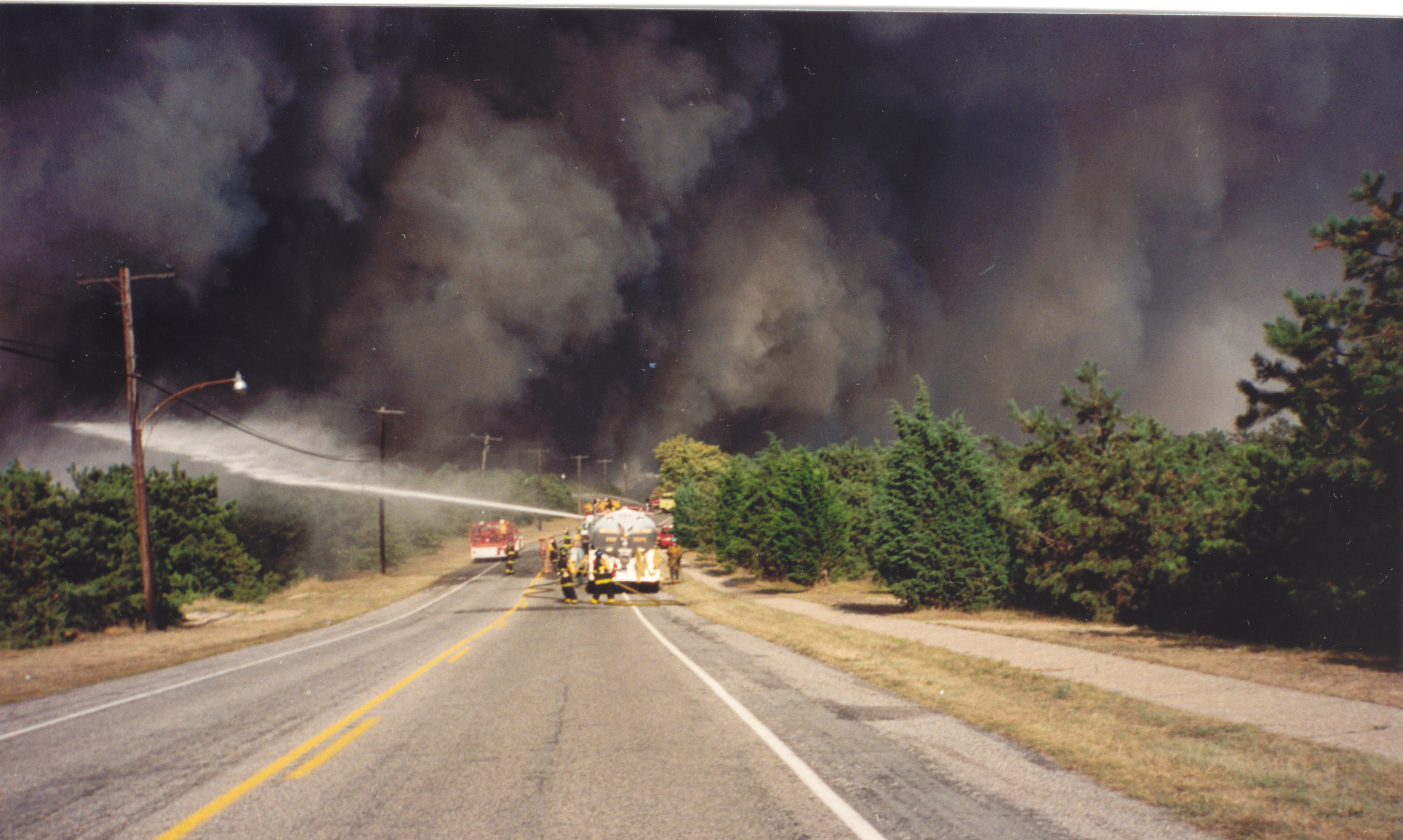 Fire companies from all over Long Island came to fight the wildfires in Westhampton in August of 1995.  COURTESY JIM BAKER.