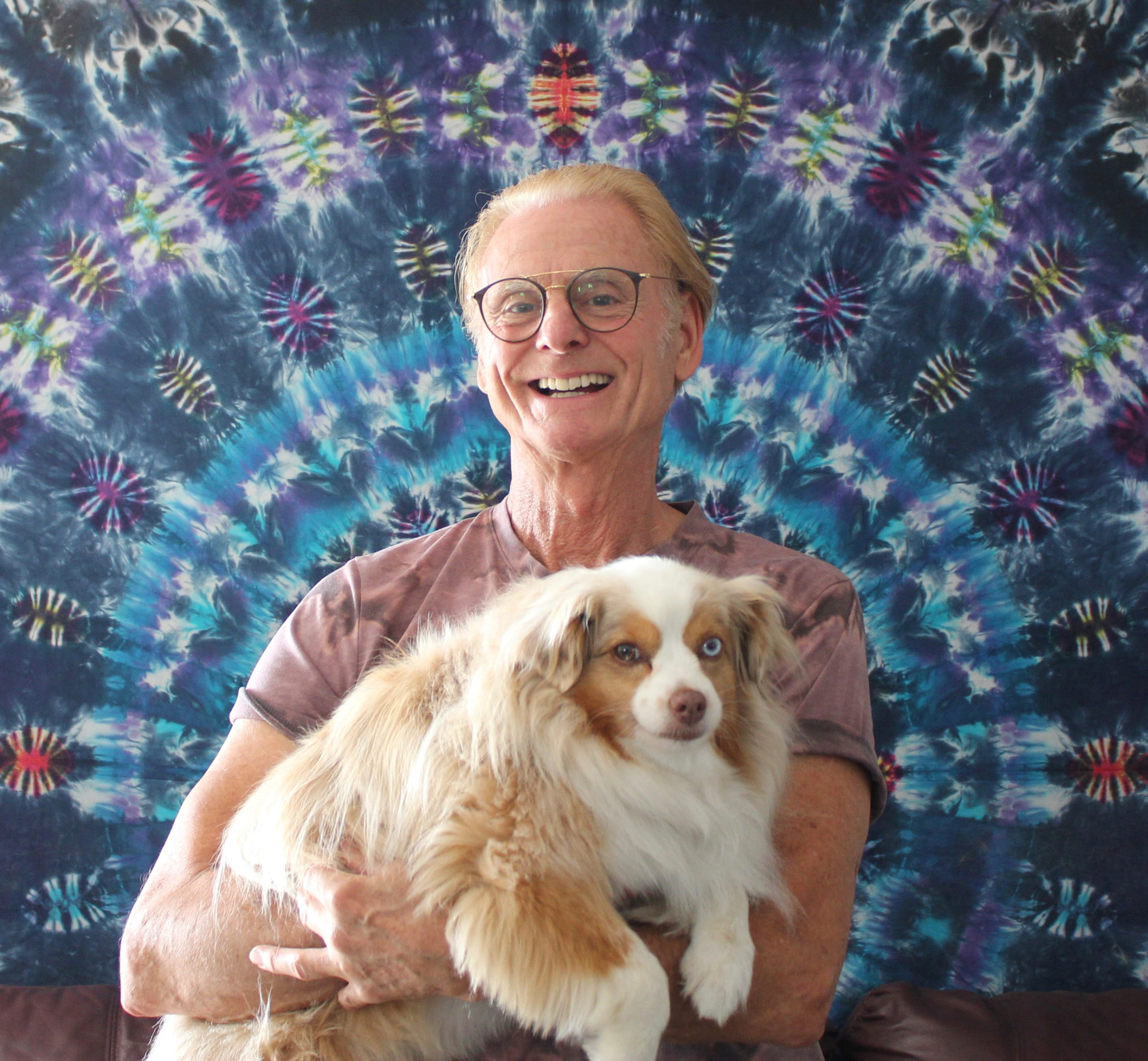 Courtenay Pollock and his dog, __, with one of his manadalas.