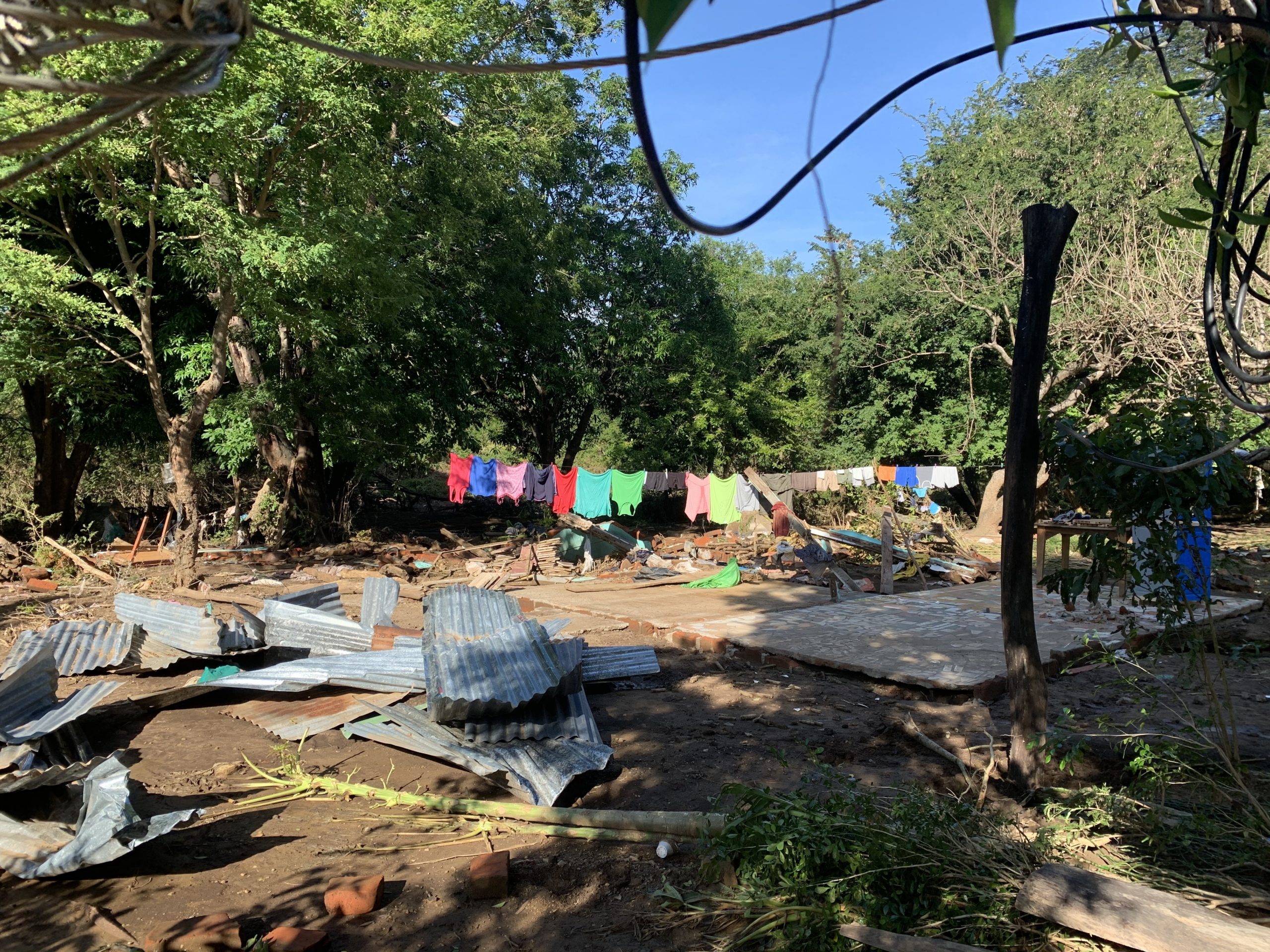 Volunteers from different communities help divide and repackage donations before distributing them to neighborhoods destroyed by hurricane flooding and high winds in Nicaragua.