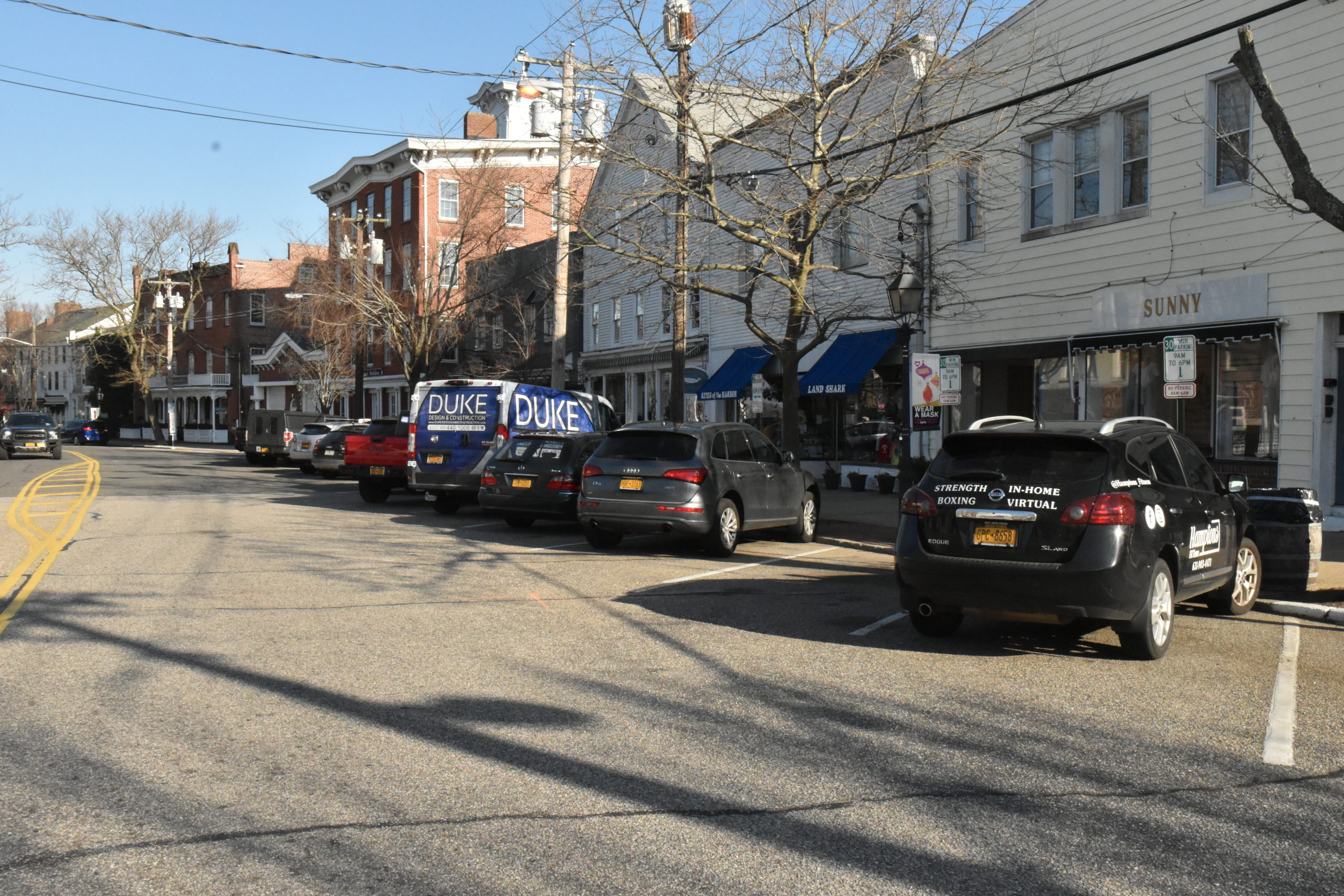 Sag Harbor Village, where parking spaces on Main Street are coveted even in the middle of winter, is considering requiring limited paid parking. STEPHEN J. KOTZ