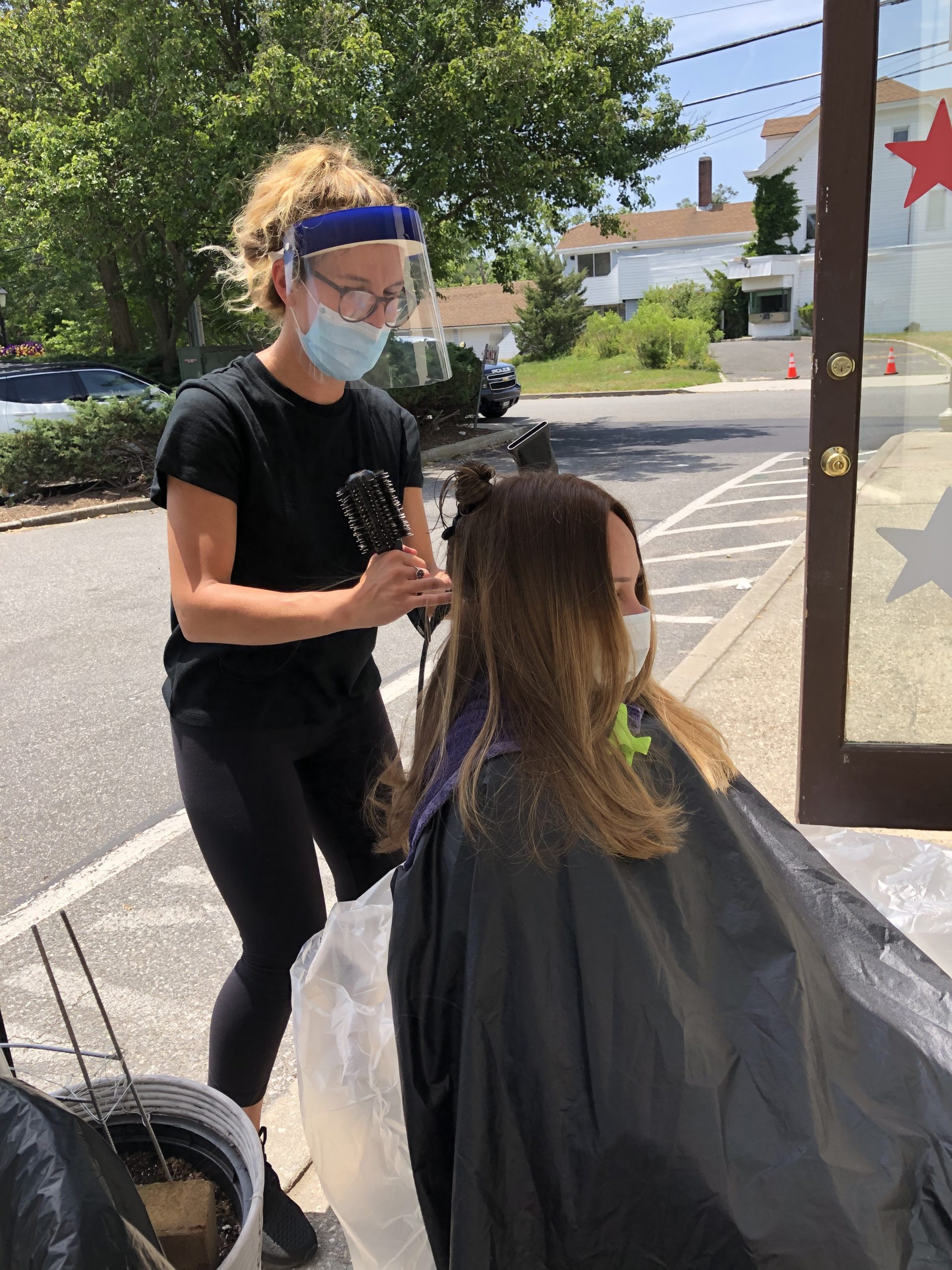 Stylist Katlyn Farrington gets creative at Lillian's Hair Salon in Westhampton Beach.