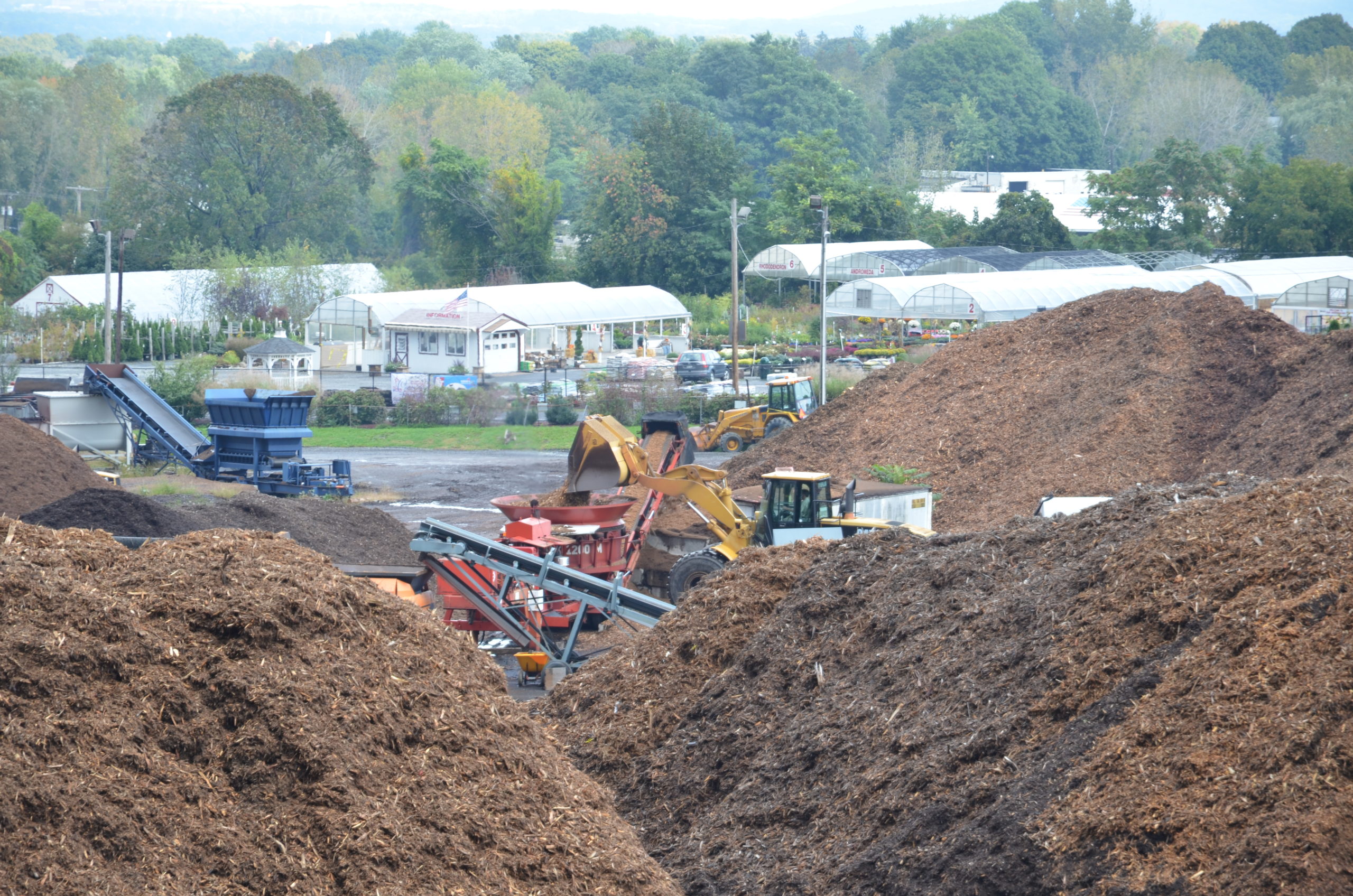 Commercial and municipal composting operations produce both mulches and composts.  These are good for a number of garden applications but don’t assume that they are 