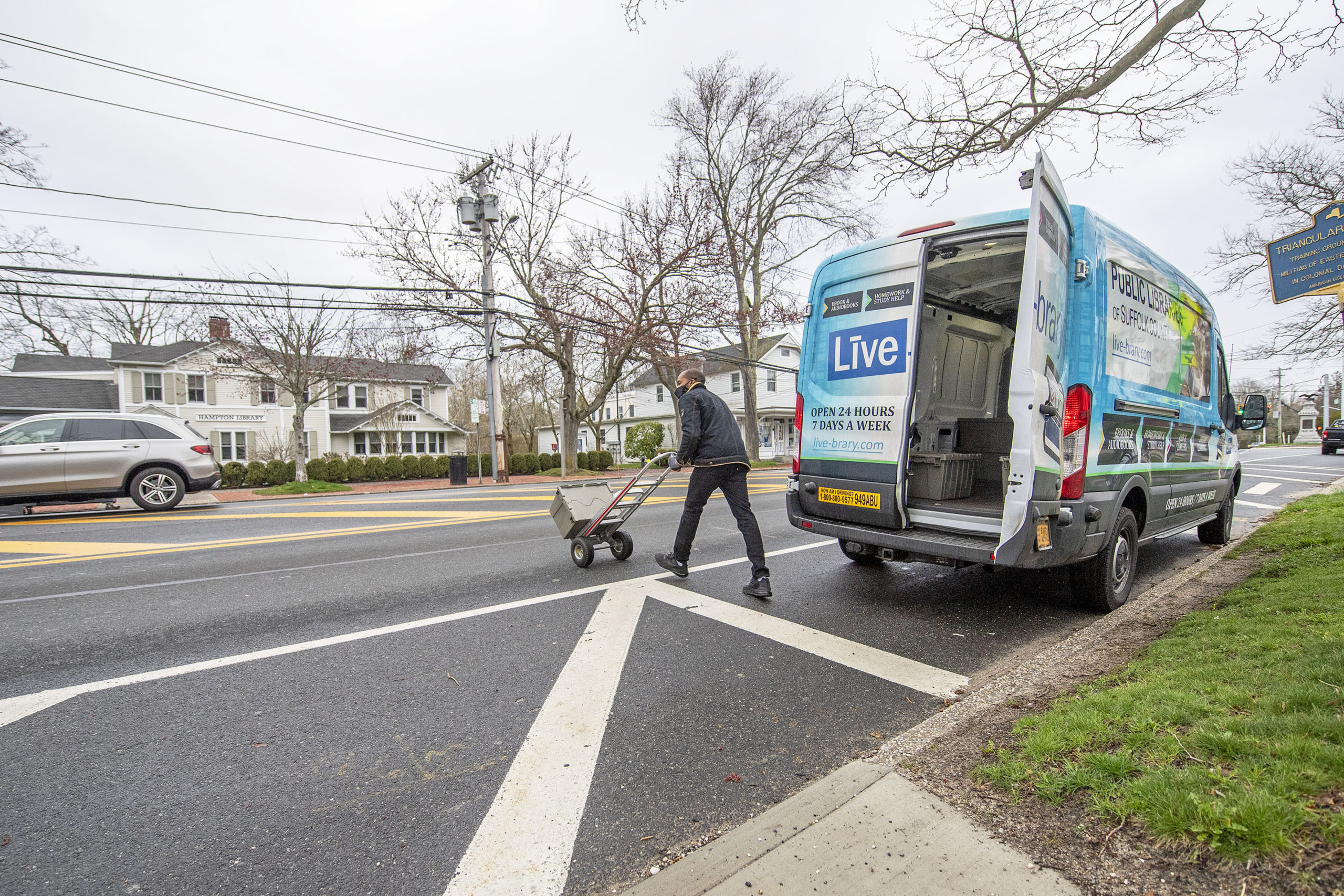 Suffolk Cooperative Library System Senior Driver Tyrell Jasper makes a stop at Hampton Library in Bridgehampton.